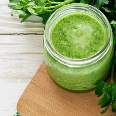 overhead view of two glasses with fresh green juice