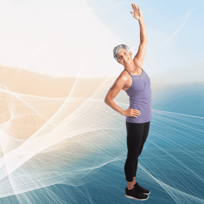 Woman in workout attire doing a standing stretch